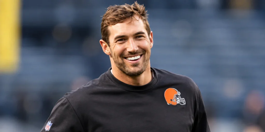 Jordan Cameron smiling in a black football shirt during a sports event